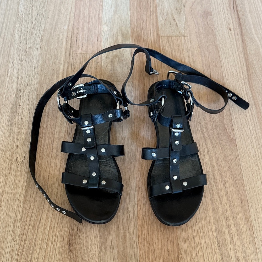 Stuart Weitzman Black Gladiator Sandals with Silver Accents